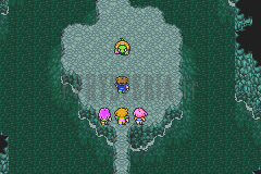 L’Antre de Ghido : grotte vert sombre, le groupe face à une tortue (version GBA)