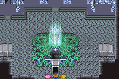 La salle du cristal du feu : le cristal au centre de ses racines, le groupe en bas (version GBA)