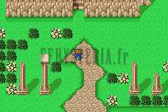 Les ruines de Gohn : colonnes brisées sur l’herbe et chemin de terre (version GBA)