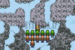 Une colonne de soldats impériaux en vert gravit les falaises enneigées (version GBA)
