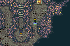 Les galeries de roche grise de la Grotte du Phénix, au bord de l’eau, avec deux personnages (version GBA)