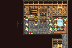La maison de Lola à Maranda, remplie de fleurs, une jeune femme près de la table (version GBA)