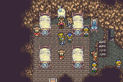 L’abri souterrain de Mobliz dans la version GBA : lits alignés et enfants autour du groupe (version GBA)