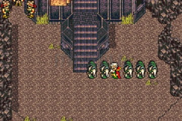 Au pied de la Tour des fanatiques, une file de fanatiques en robe verte ; un vieil homme au manteau rouge marche parmi eux (version GBA)