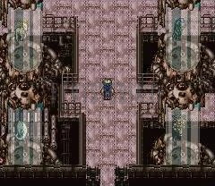 Un couloir de l’Usine magitech entre les cuves, au sol rose (version SNES)